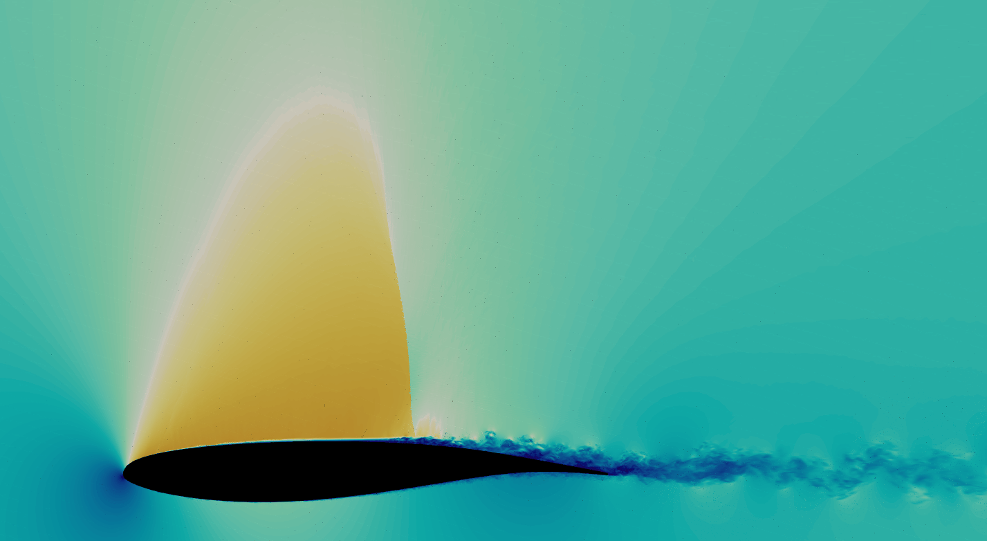 Animated pressure-field simulation around a transonic aircraft wing cross-section. Colors show pressure changes, with a curved shock wave standing above the upper surface and a turbulent wake forming behind the trailing edge. Small blue vortices continuously emerge, merge, and dissipate as they interact with the shock, illustrating the unsteady shock–boundary layer interaction that drives shock buffet.